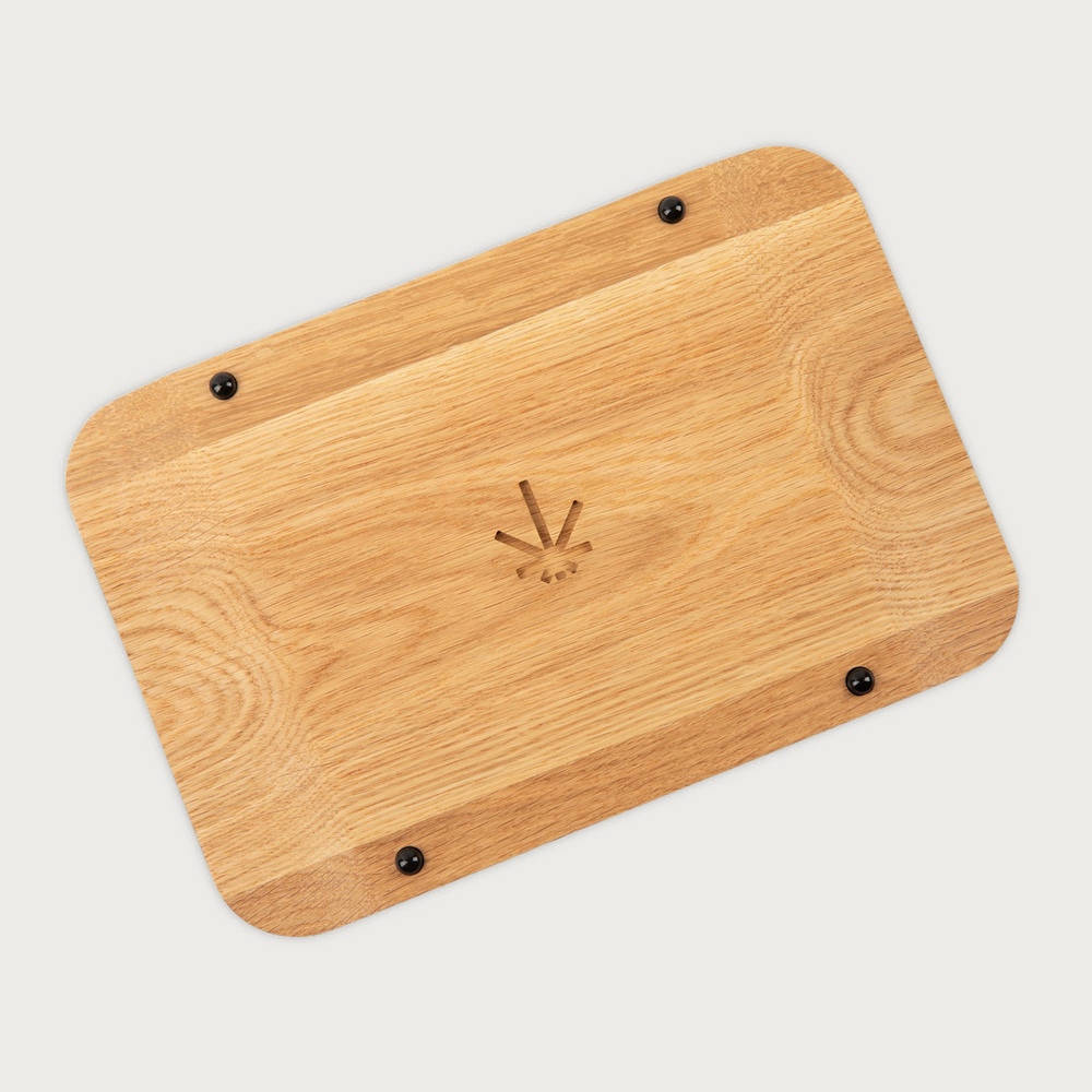 A single green leaf against a white background.