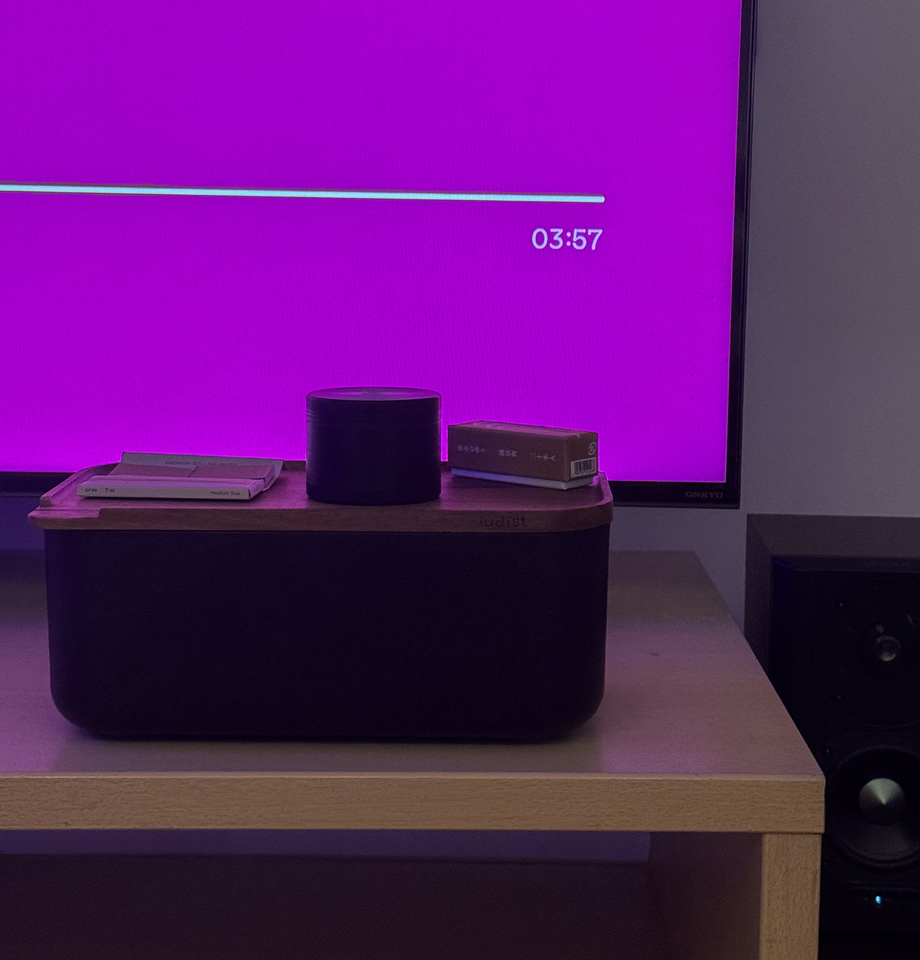 A single green leaf against a white background.